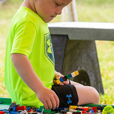 Child creates in Lego Lane.